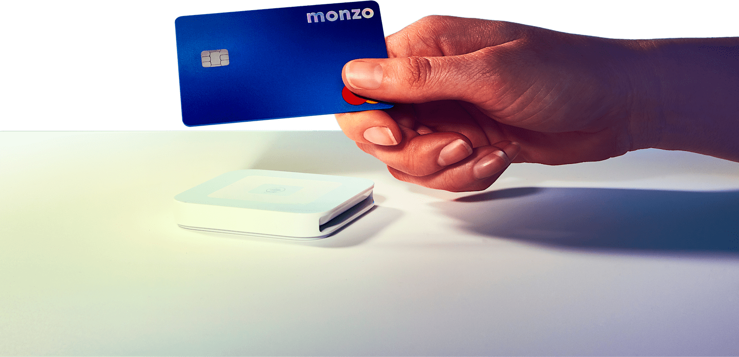 Monzo Plus card in hand - transparent - hero