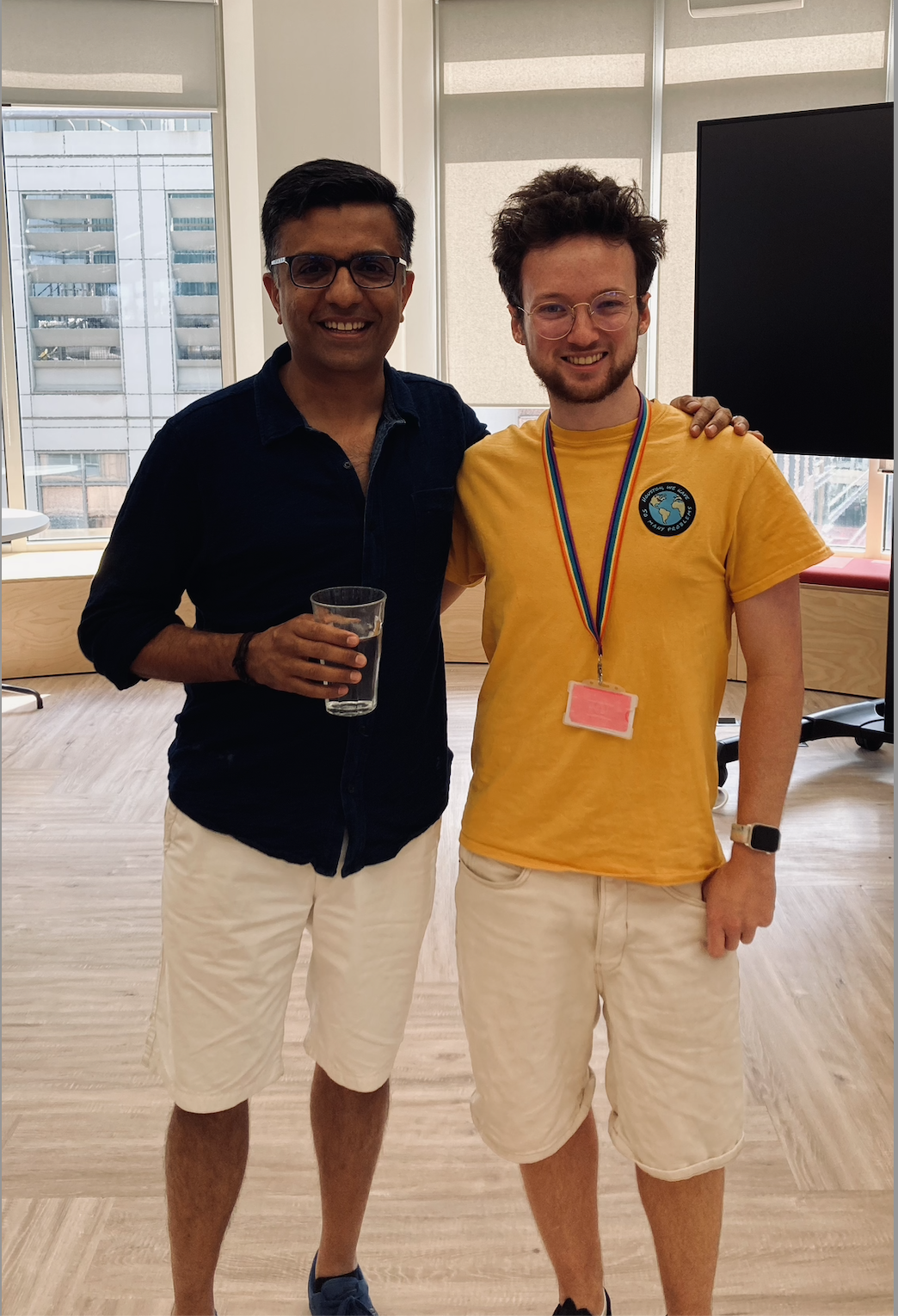 The author Bee meets Monzo CEO TS Anil. Both are facing the camera wearing tshirts and shorts.