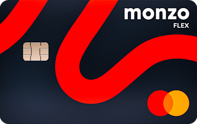 A Monzo Flex credit card, in dark blue with a hot coral line waving across it, and the mastercard logo in the corner.