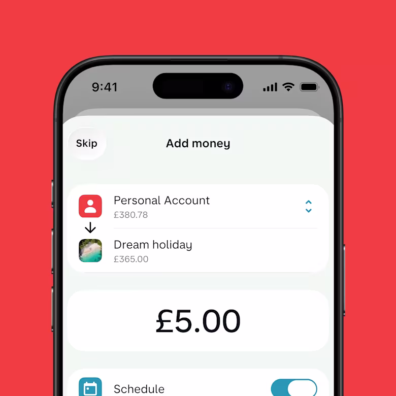 A smartphone showing £5 being deposited into a 'Dream holiday' savings pot, with a toggle option to schedule the transfer.