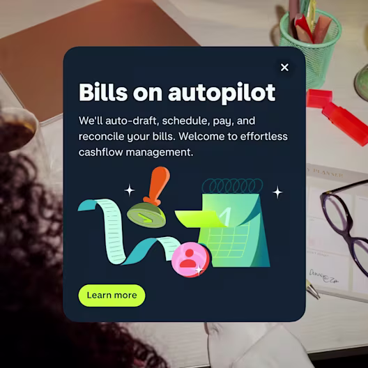 An app screenshot showing a notification about having bills paid on autopilot