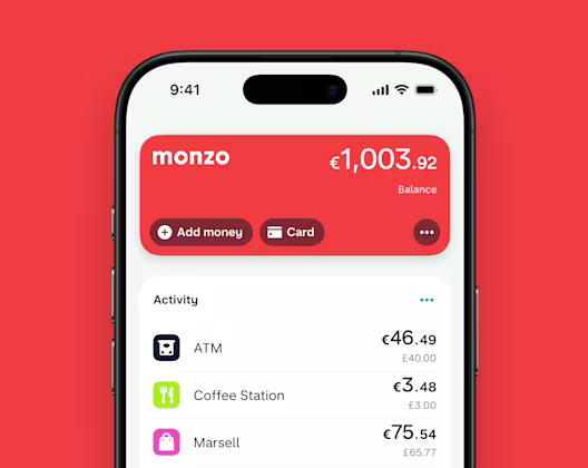 the Monzo UI on a phone with a hot coral background, showing card transactions with exchange rates at an ATM, coffee station and a purchase.