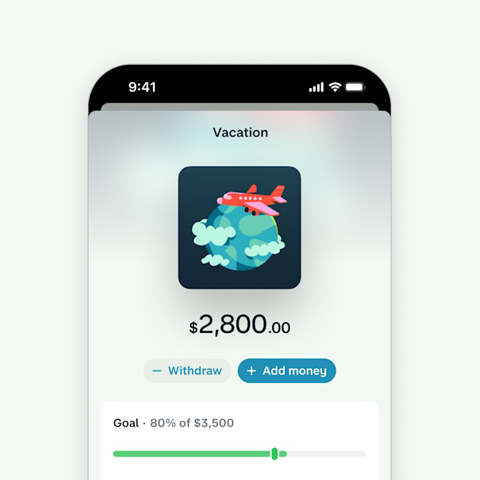 A screenshot of the Monzo app showing a Savings Jar called Vacation. It has an image of an airplane traveling around the world. There is a $2800 balance with a Goal of $3500 and a progress bar at 80%