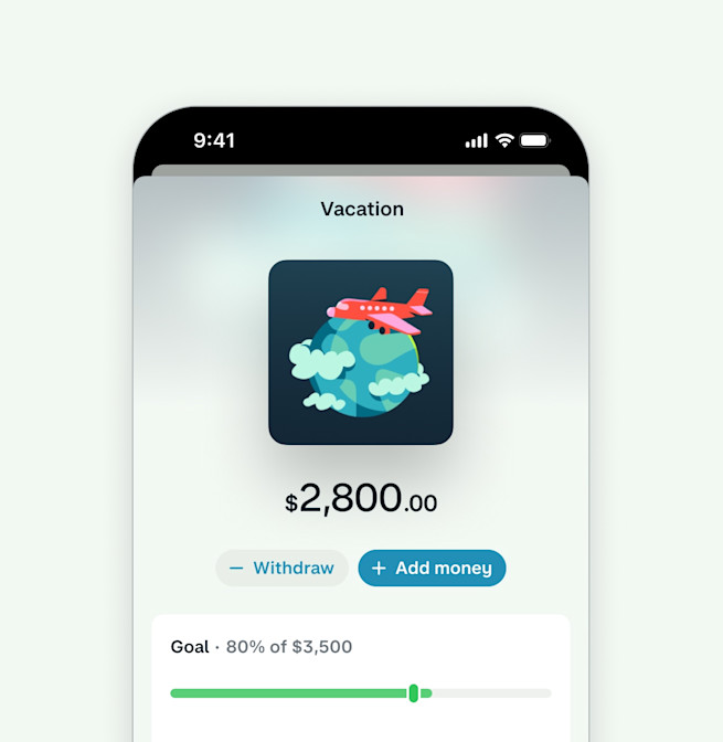 A screenshot of the Monzo app showing a Savings Jar called Vacation. It has an image of an airplane traveling around the world. There is a $2800 balance with a Goal of $3500 and a progress bar at 80%