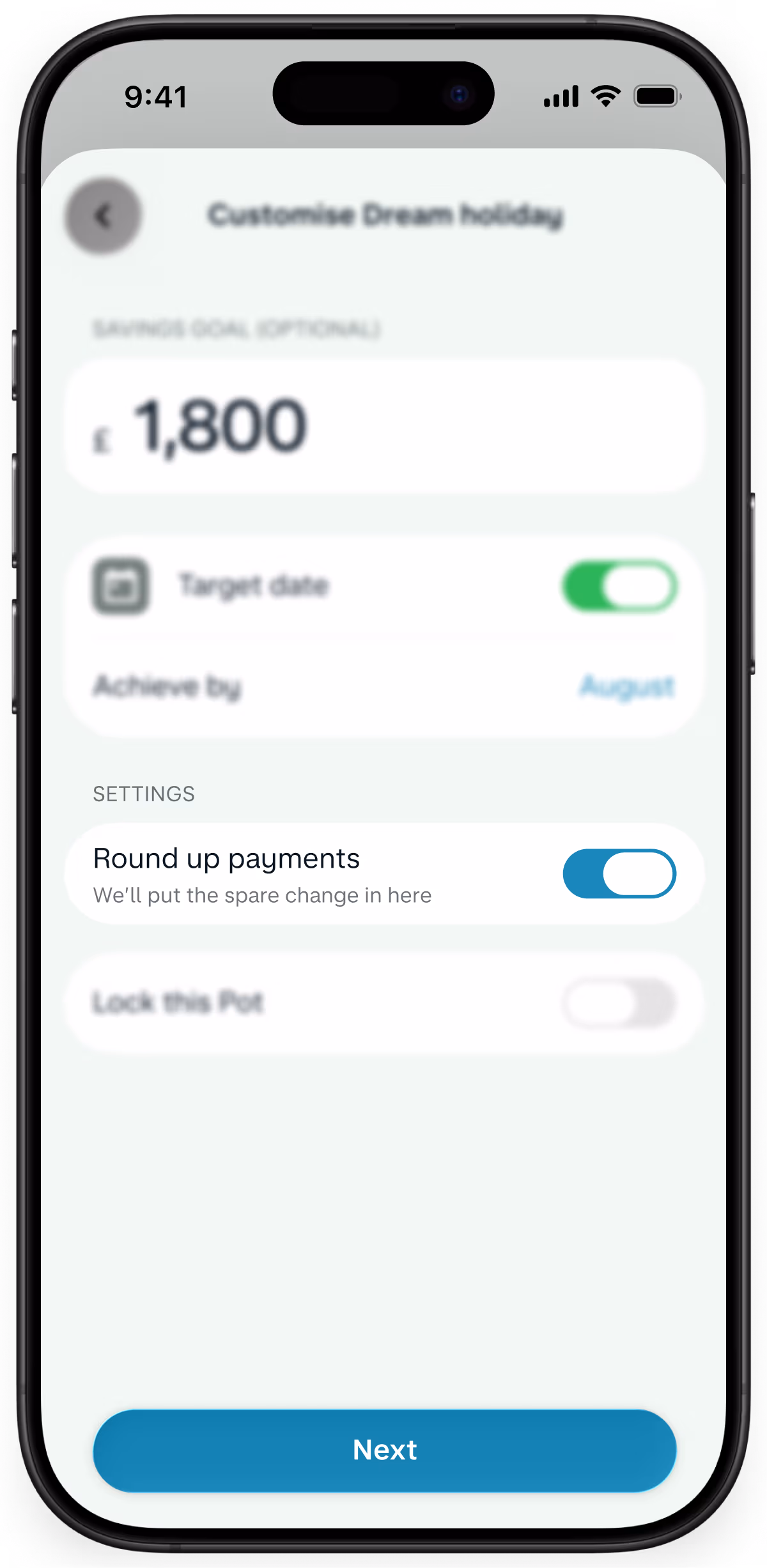 A smartphone displaying Monzo savings pot settings with the round-up payments feature enabled.