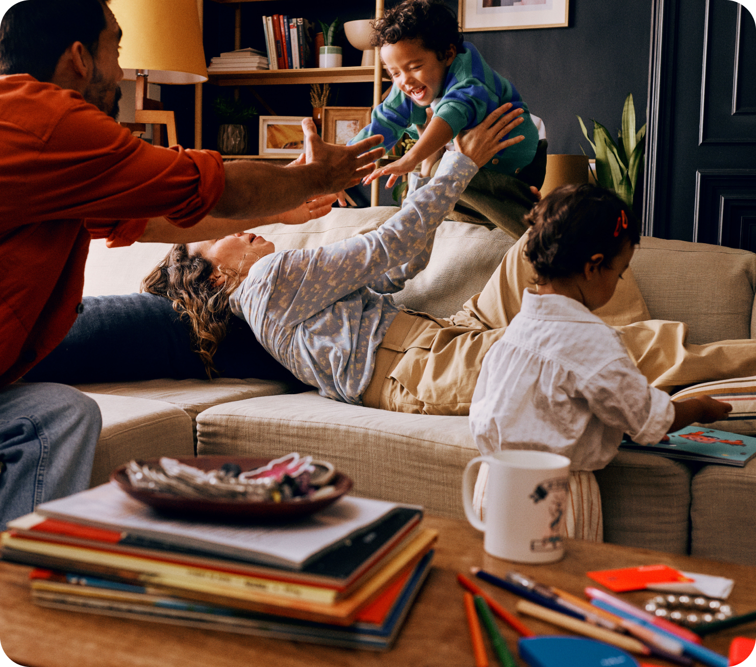 Family playing around in their living room