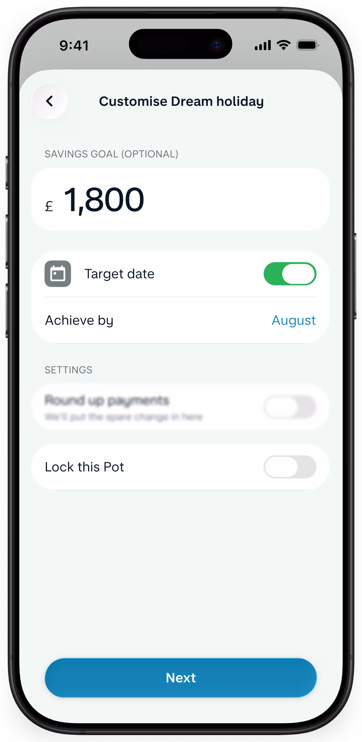 A smartphone displaying a Monzo app setup screen titled 'Customize Dream Holiday,' showing a target goal input field of one thousand eight hundred pounds.