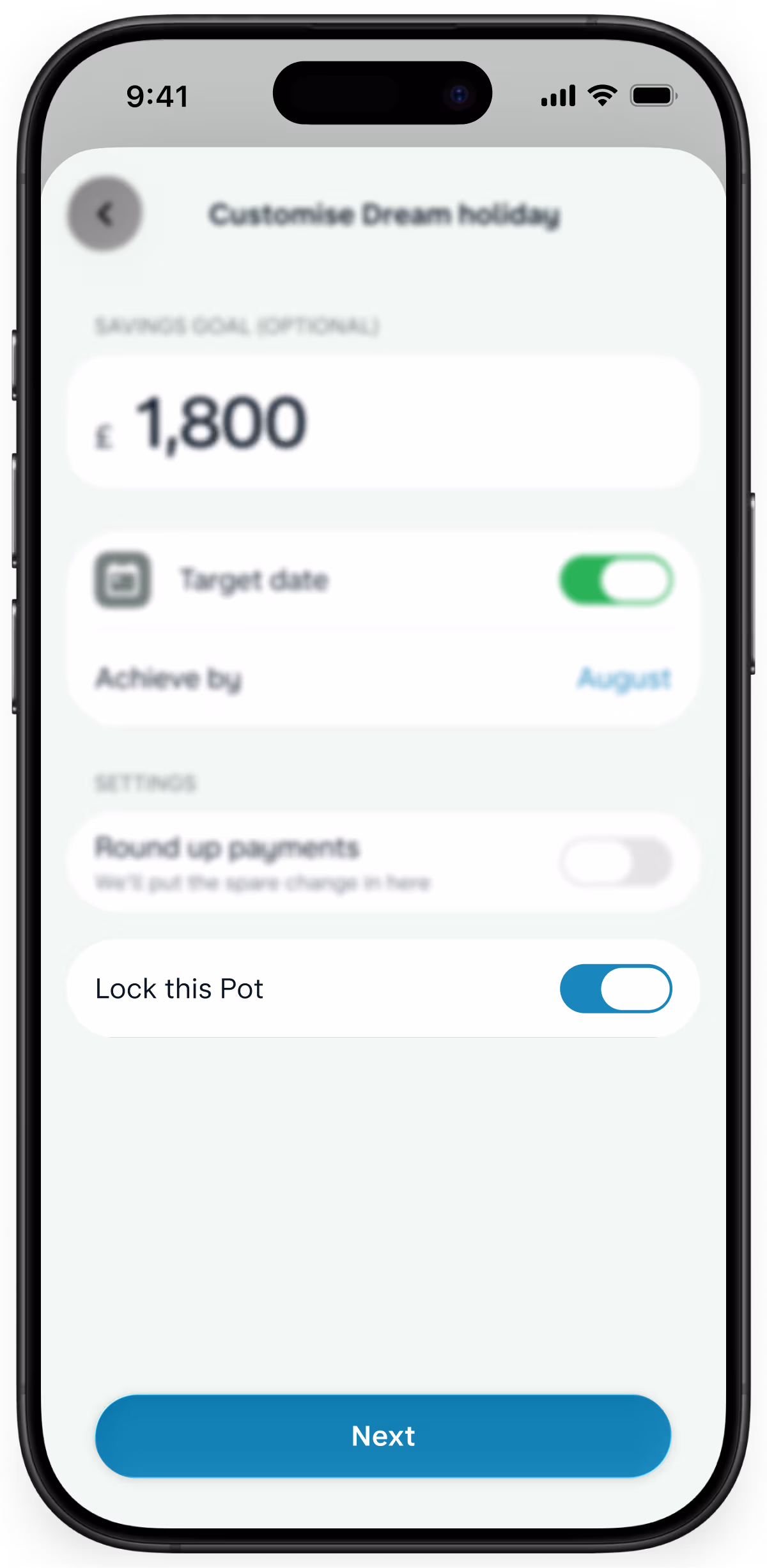 A smartphone displaying Monzo savings pot settings with the option to lock the pot enabled for extra security.