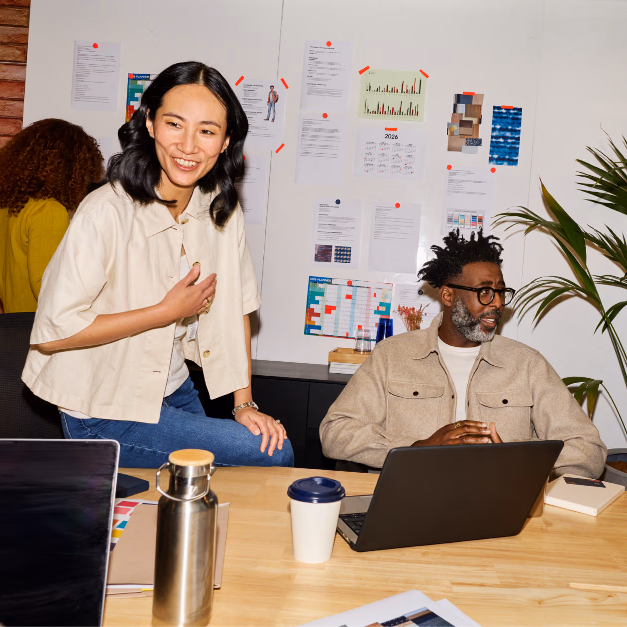 Two colleagues having a meeting in the office