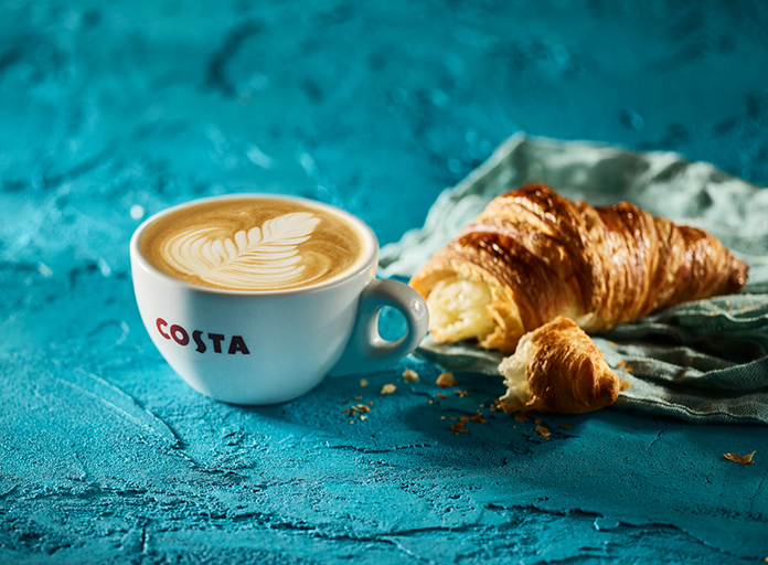Costa coffee flat white with croissant
