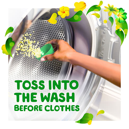 Toss Gain Original Fireworks Scent Booster into the wash before clothes 