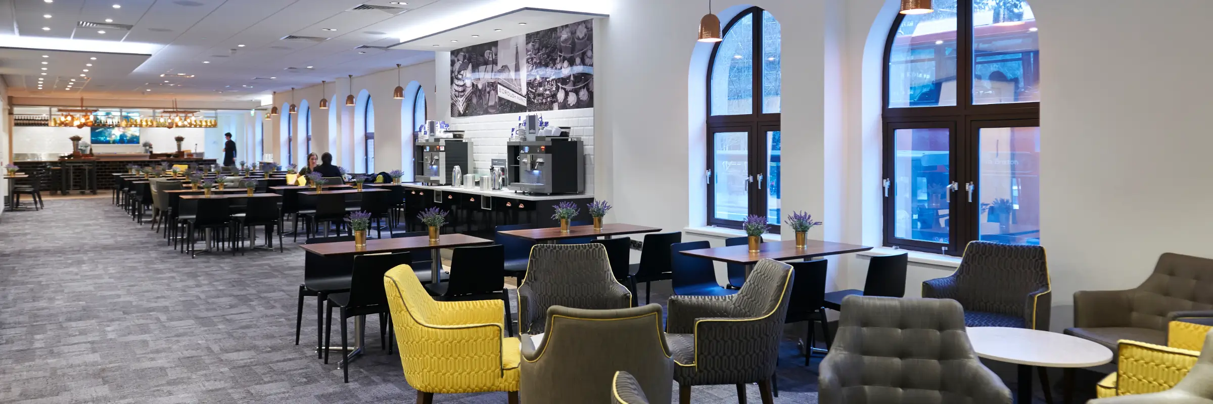 Ground floor dining and lounge area at Prospero House. Attendees can use this space during lunch and breakfast as well grab a coffee and work.