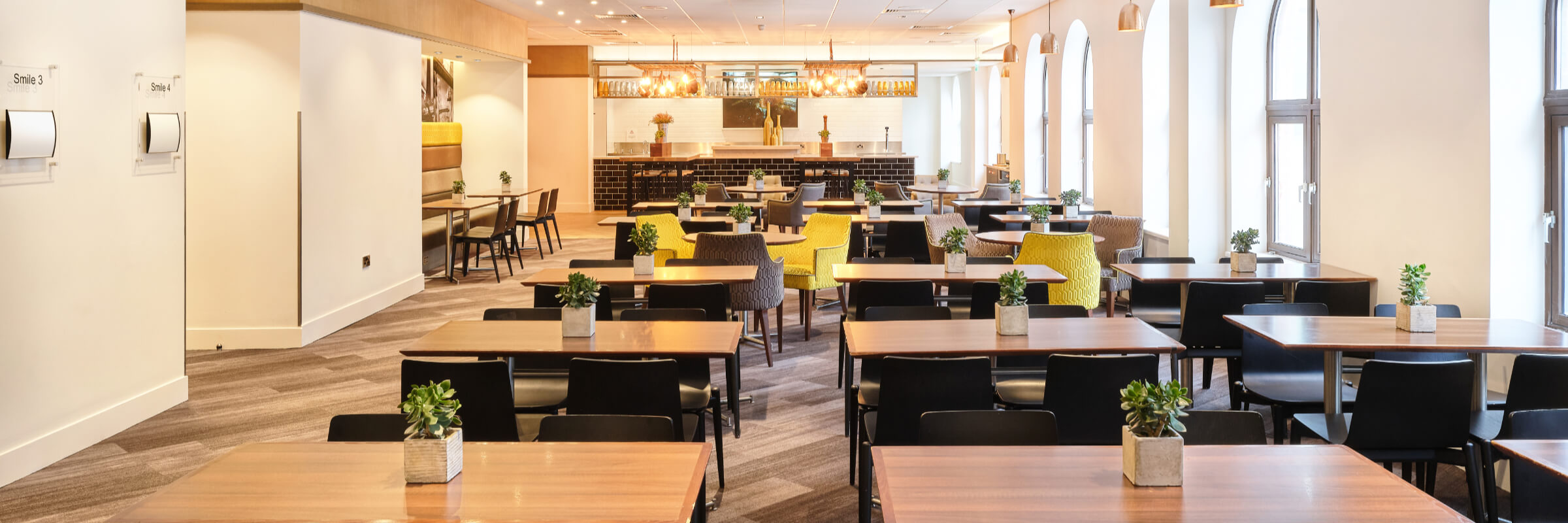Ground floor dining area at Prospero House. Attendees can use this space during lunch and breakfast as well grab a coffee and work.