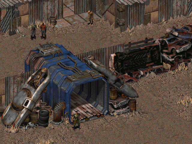 A person stands guard outside the entrance to a base