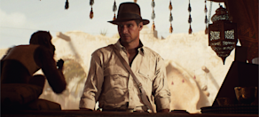 Indiana Jones wears the Cairo Outfit from the Machinegames Anniversary Update at a market stall in Gizeh