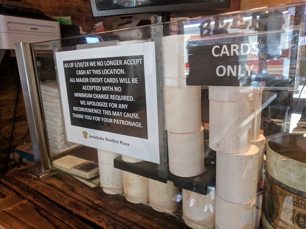 No Cash Please – a sign in a Pizza place saying “Cards Only”