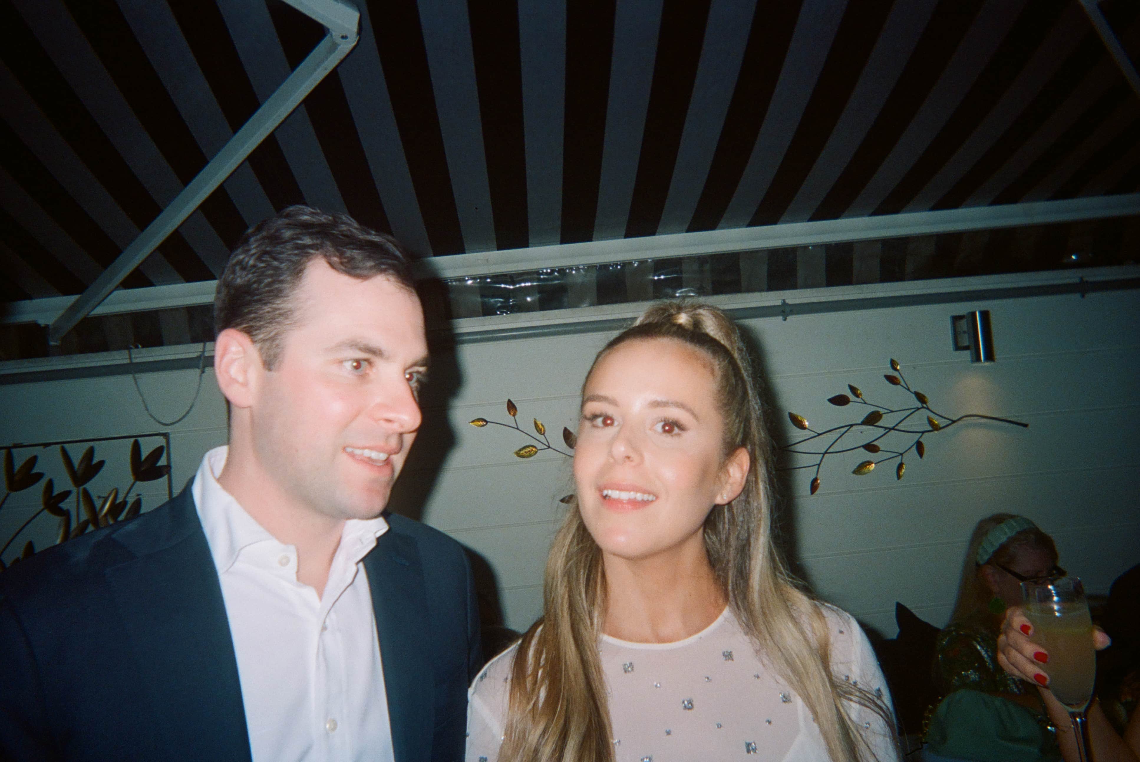 Two people standing together.