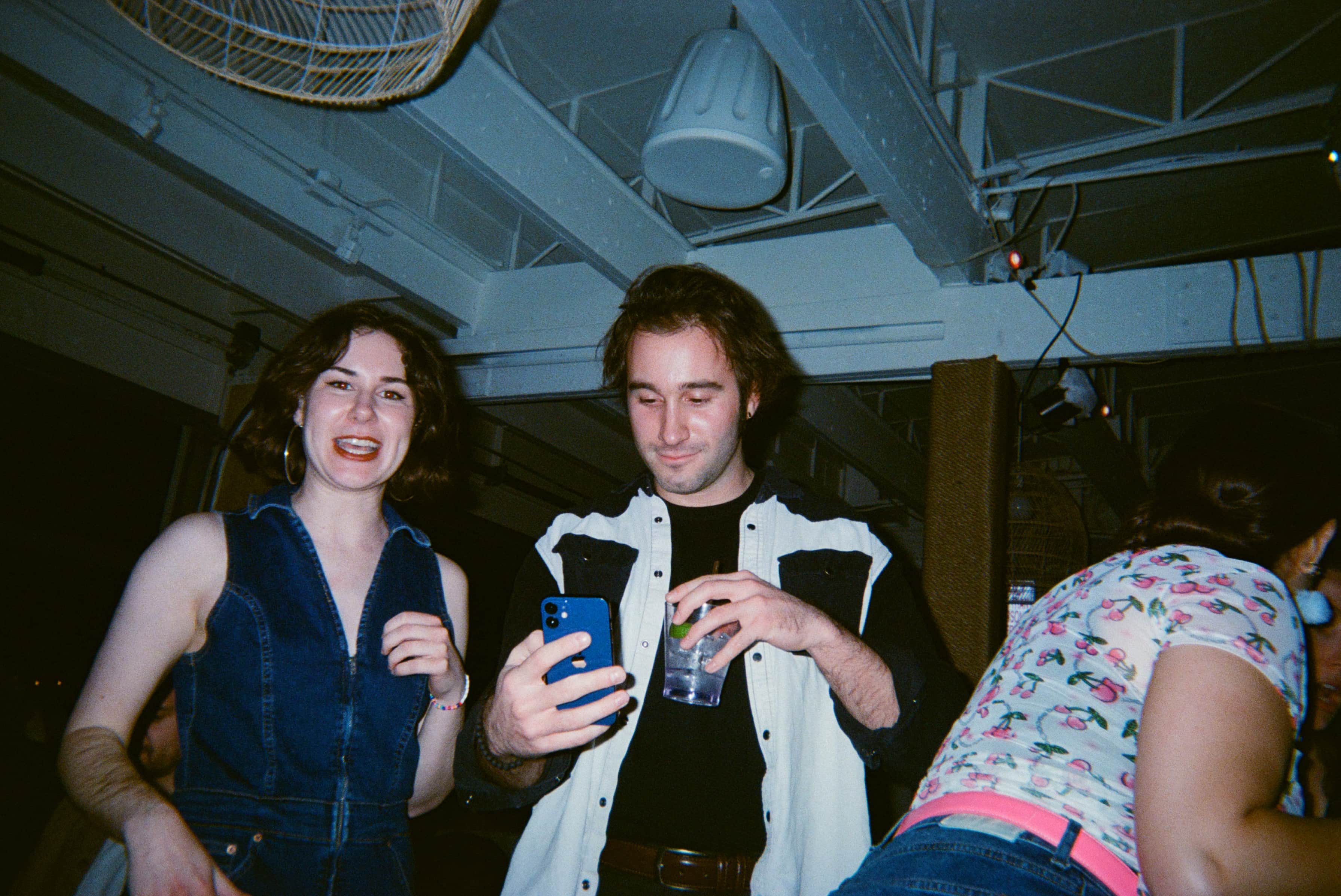 Two people at a birthday party.