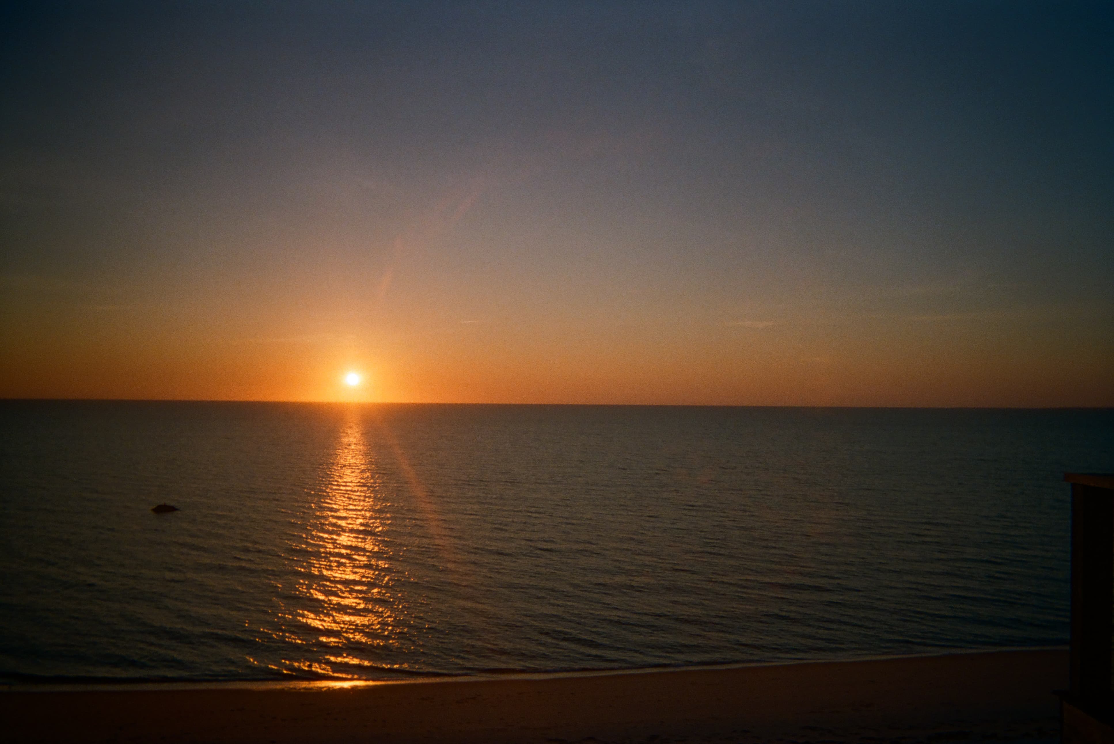 A sunset over a body of water.