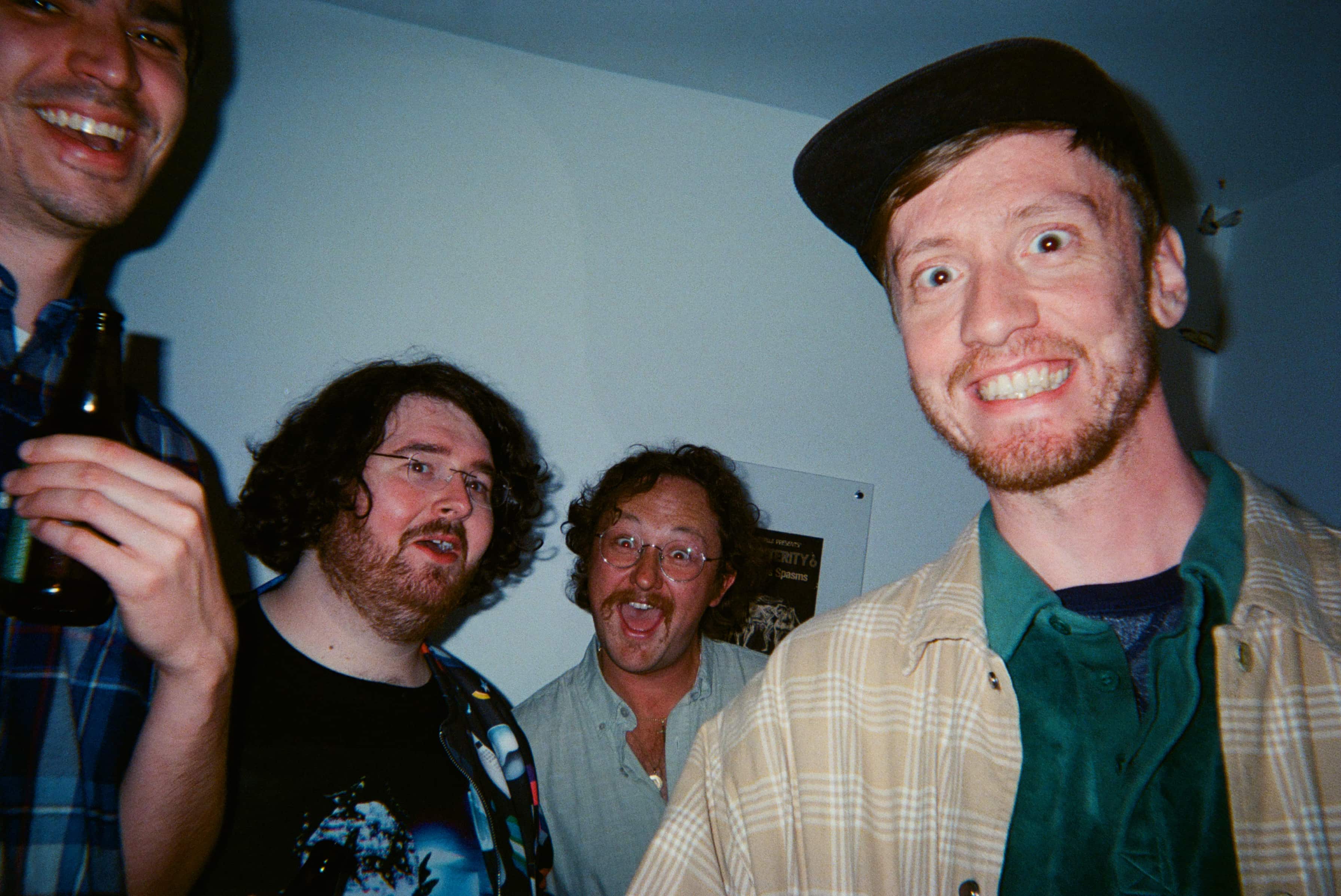 A group of men posing for a photo.