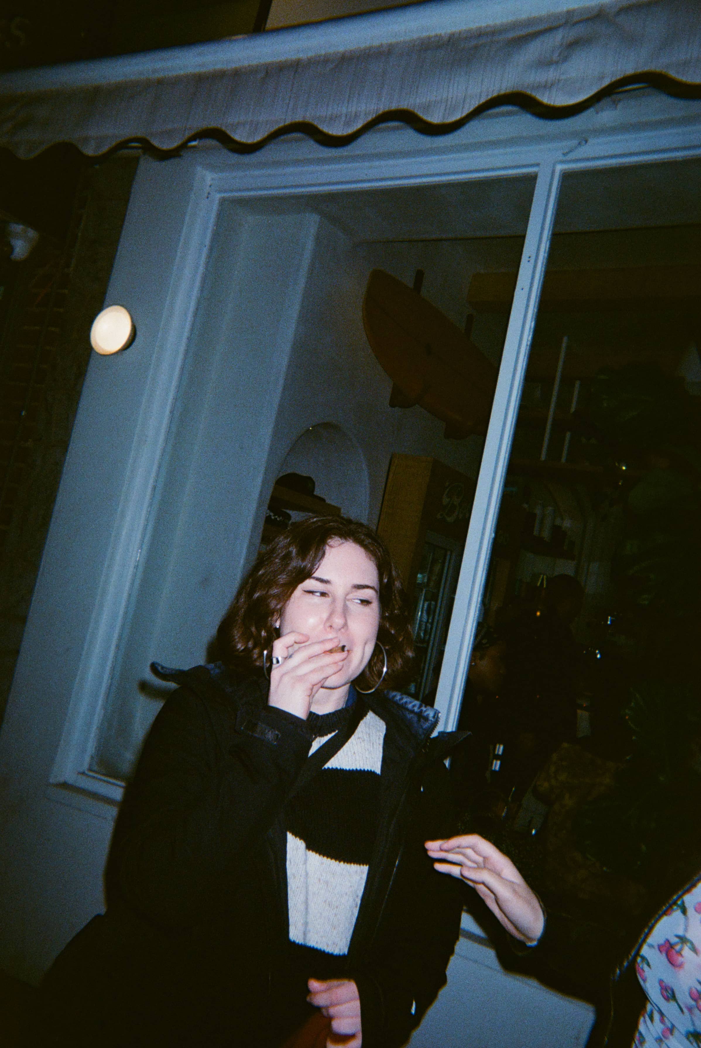 A person smoking a cigarette.