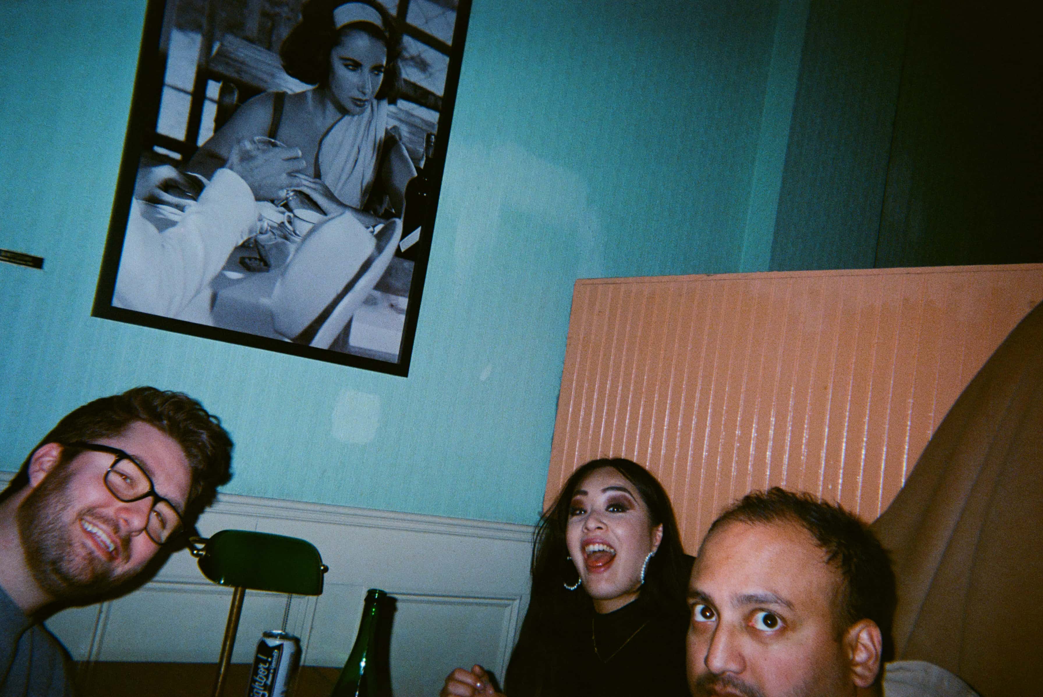 A group of people sitting at a table.