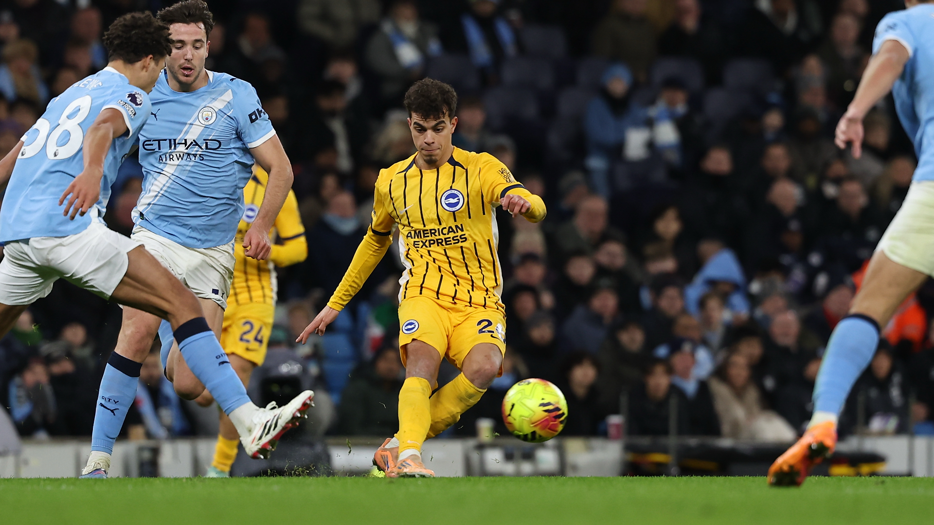 Yasin Ayari in Brighton away kit playing against Manchester City at the Etihad