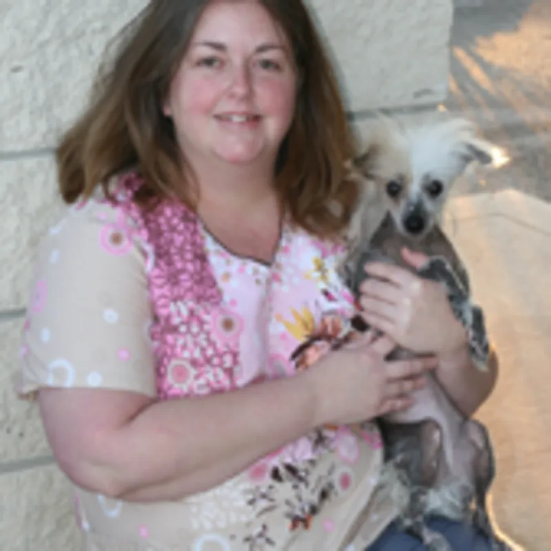 Kelly with a small dog Kelly with a small dog