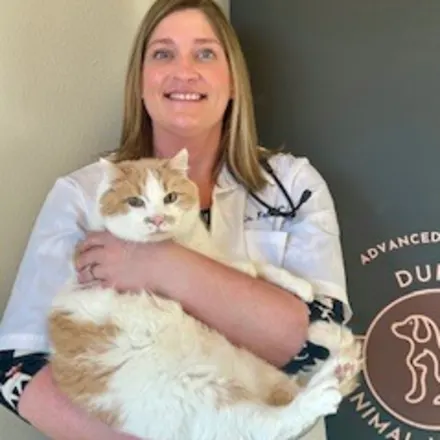 Katie Bensen at Dunes Animal Hospital, with cat