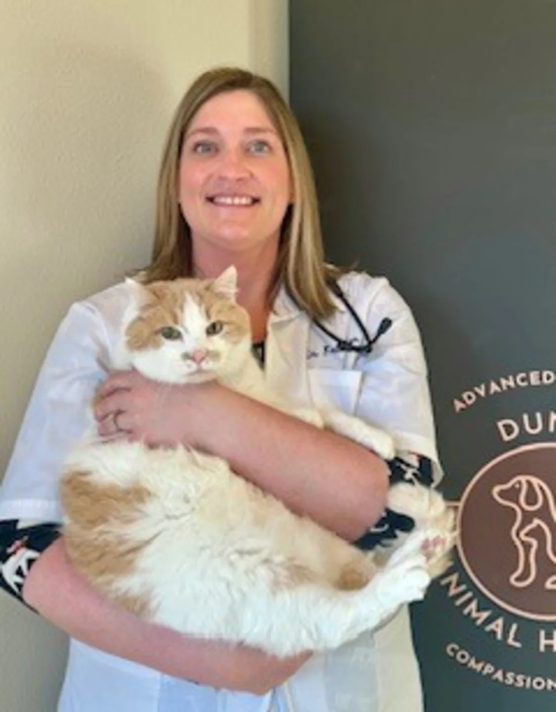 Katie Bensen at Dunes Animal Hospital, with cat Katie Bensen at Dunes Animal Hospital, with cat