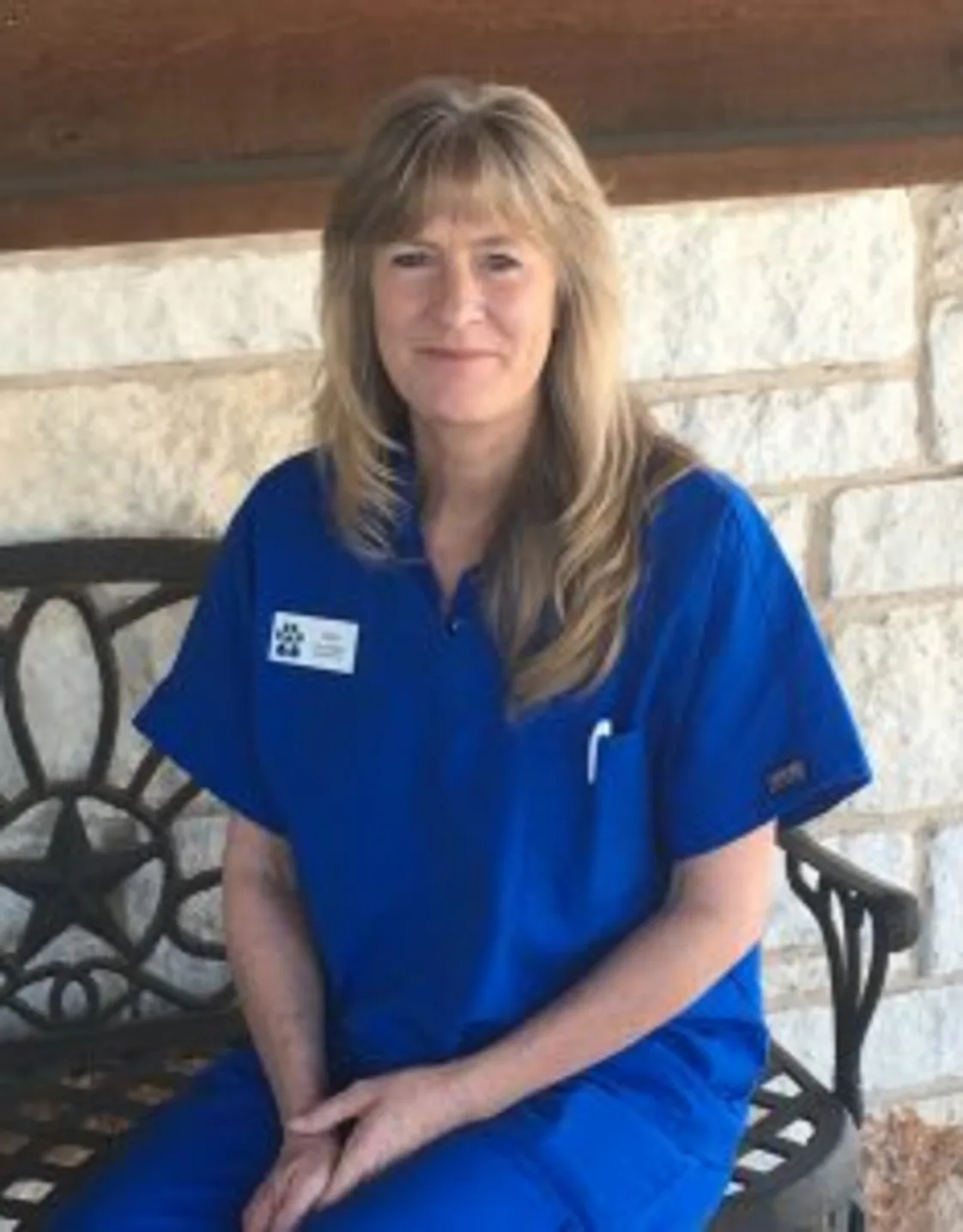 Tina Denny sitting on a bench Tina Denny sitting on a bench