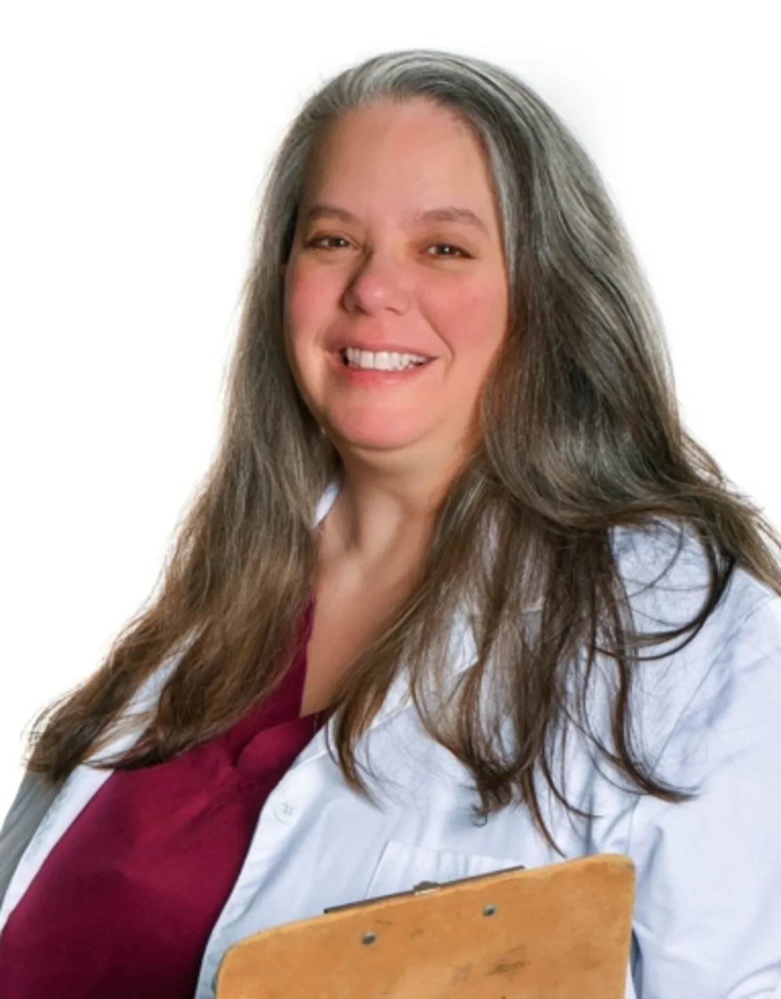 Dr. Sarah Neaderhouser posing with a clipboard Dr. Sarah Neaderhouser posing with a clipboard