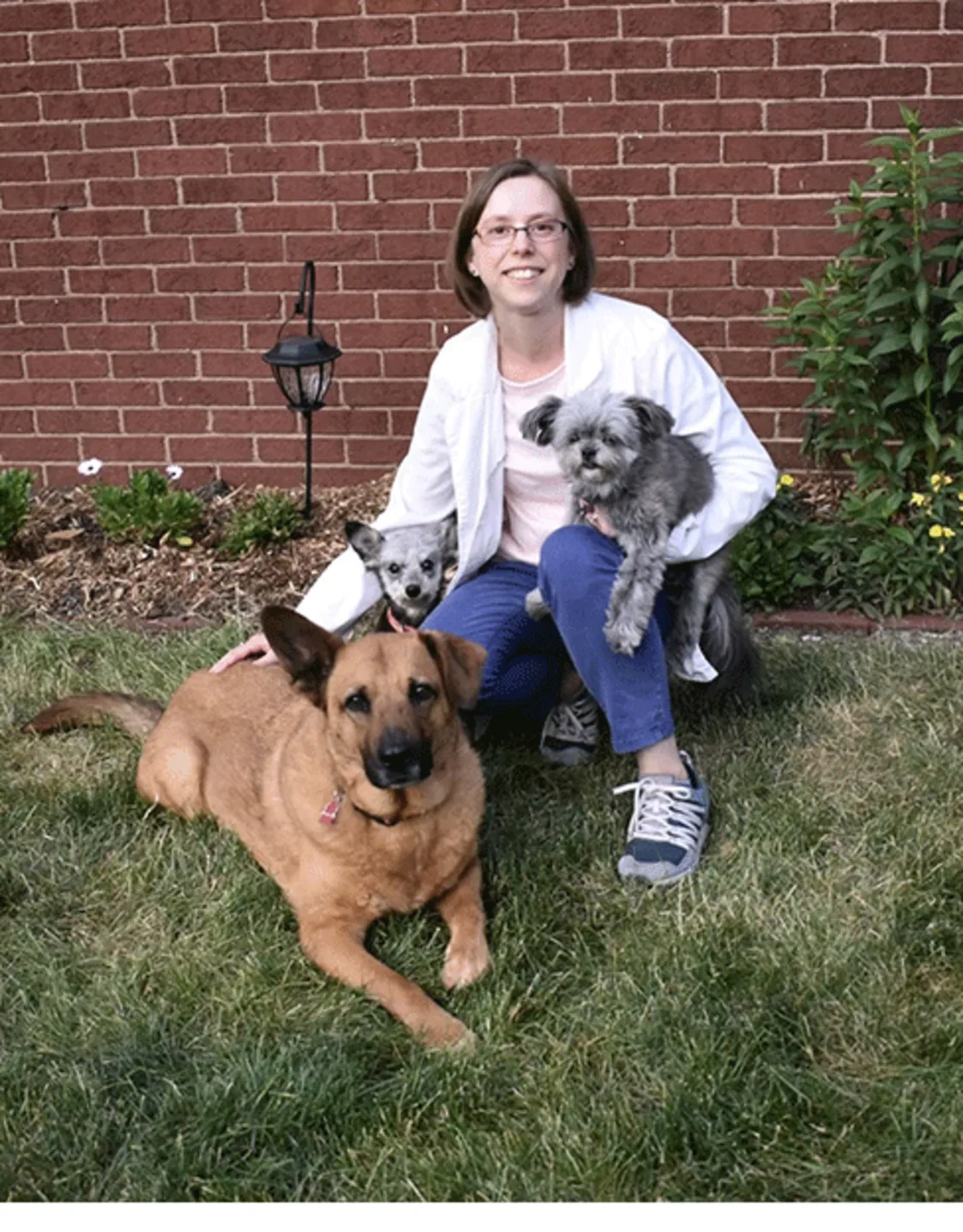 Dr. Stephanie Oedewaldt with 3 dogs Dr. Stephanie Oedewaldt with 3 dogs