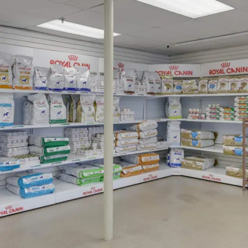  Owl Creek Veterinary Hospital's in store pharmacy store where they have a bunch of products for your pets on shelves.