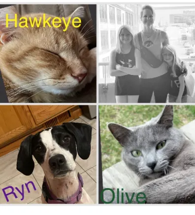 Value Vet's Vanessa with her daughters, along with photos of her two cats Hawkeye and Olive and her dog Ryn
