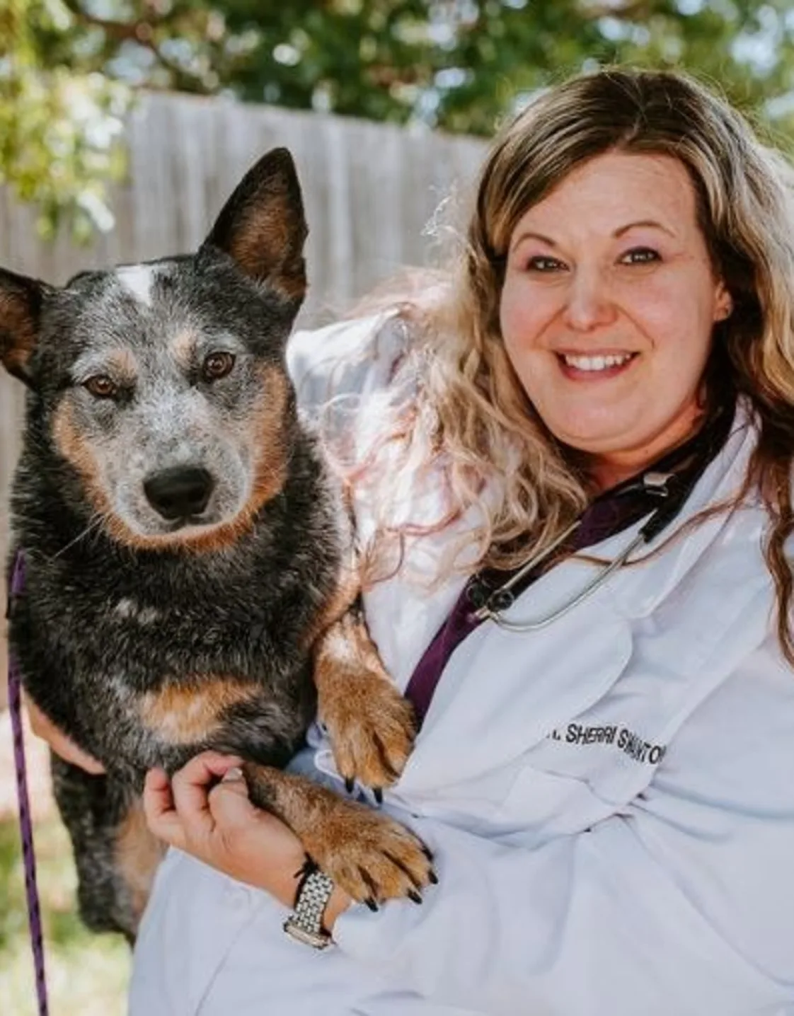 Dr. Sherri Swanton with dog Dr. Sherri Swanton with dog