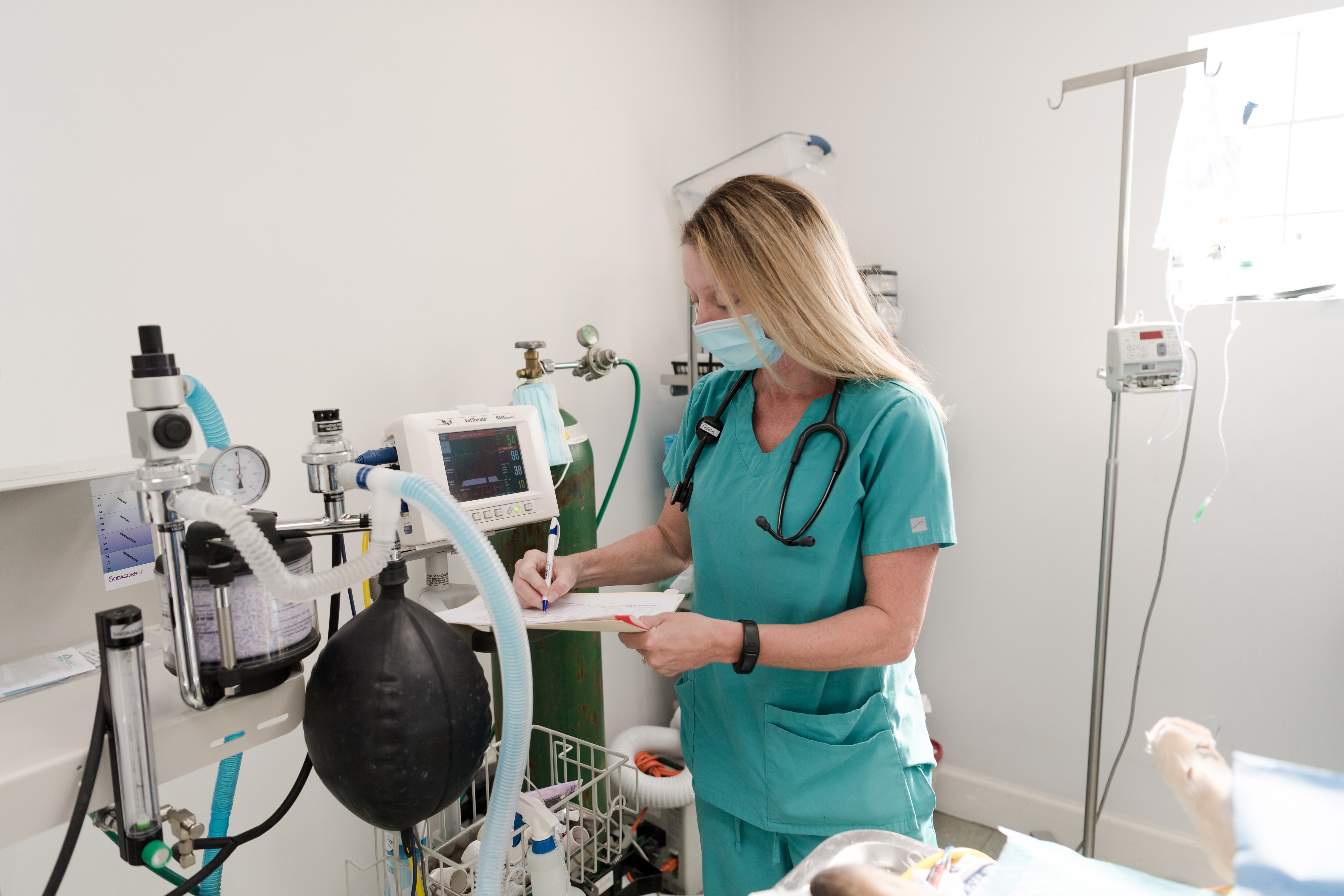 A VET WRITING NOTES DURING AN EXAM