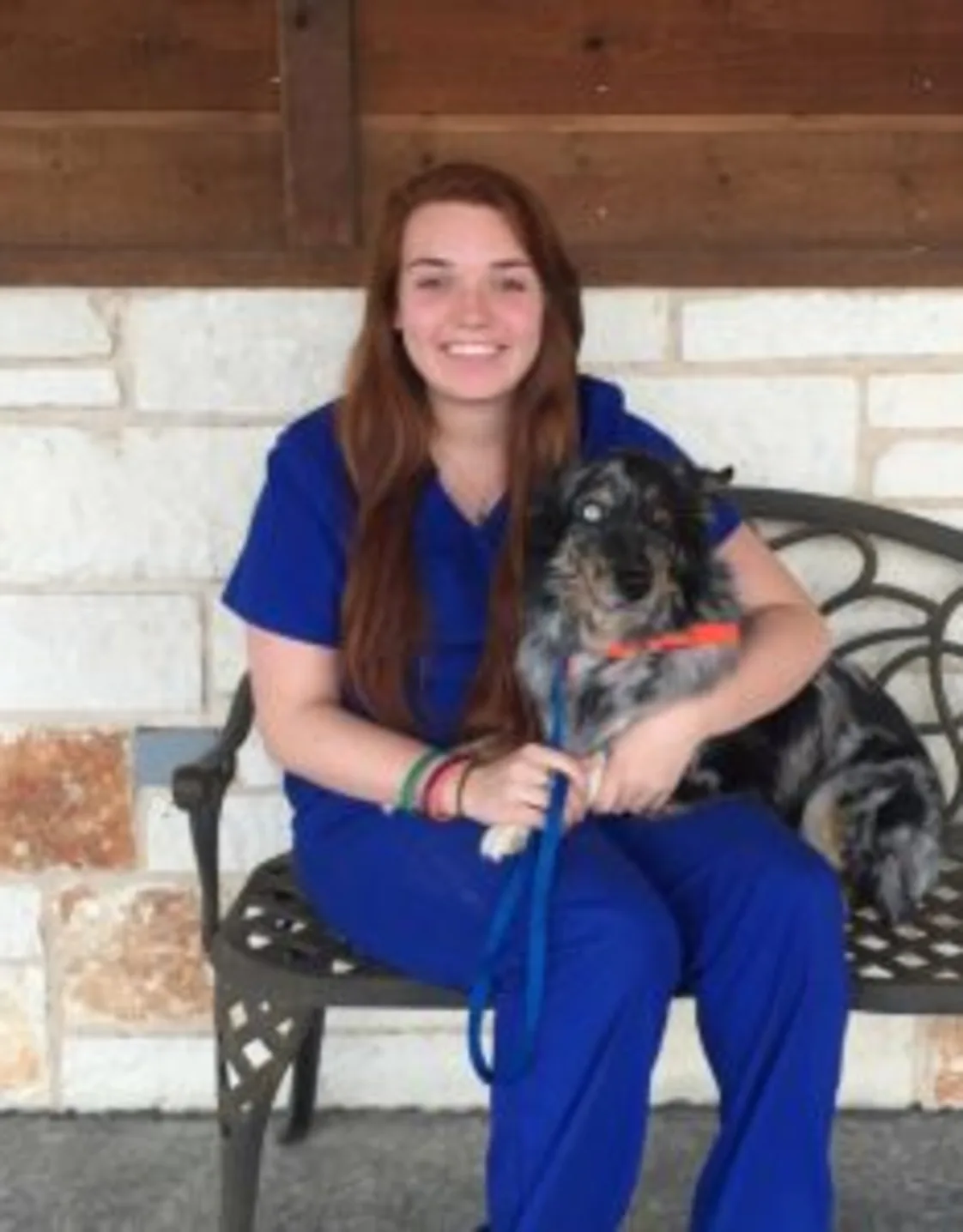 Krista sitting with a dog Krista sitting with a dog