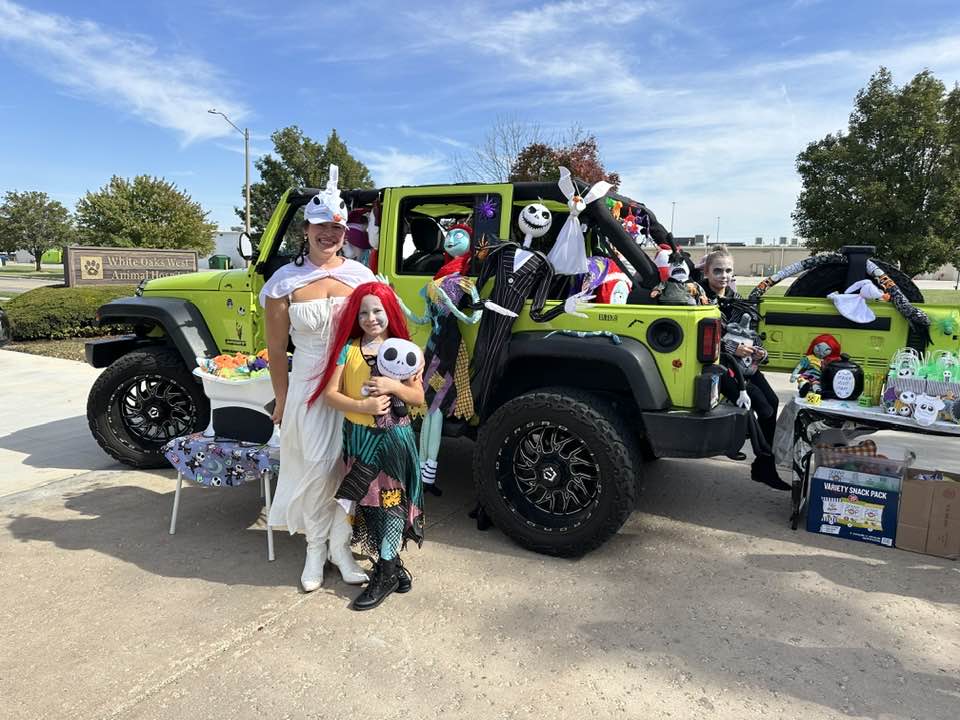 Family wearing Halloween costumes