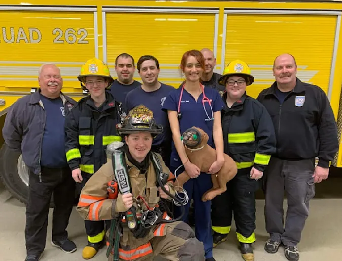 Fire department photo with Pet+ER staff. Fire department photo with Pet+ER staff.