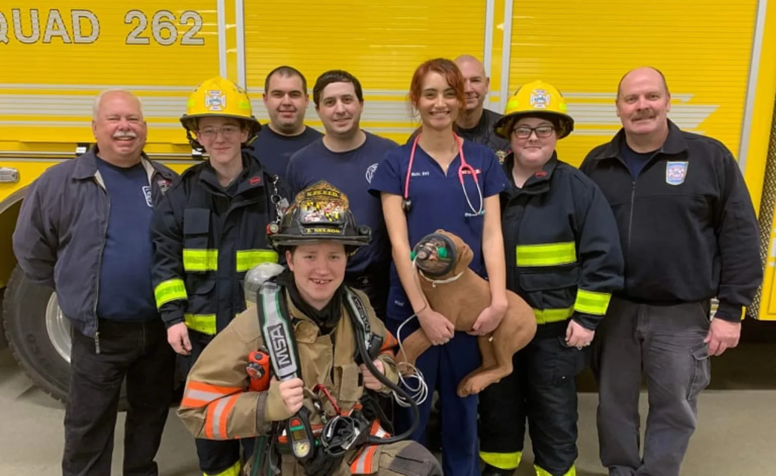 Fire department photo with Pet+ER staff.