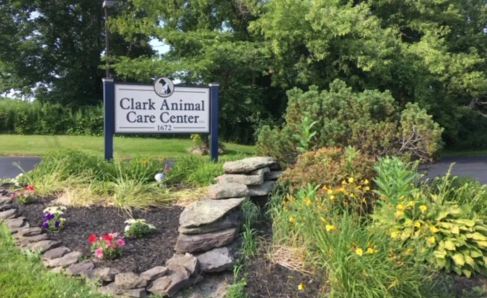 Sign and exterior of Clark Animal Care Center in Penfield