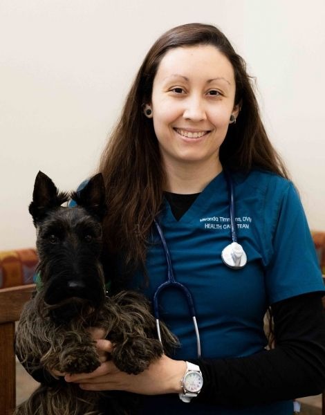 Dr. Timmons with dog.