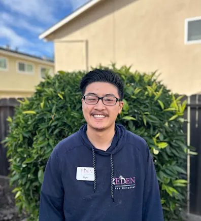 A staff member posing for a photo A staff member posing for a photo