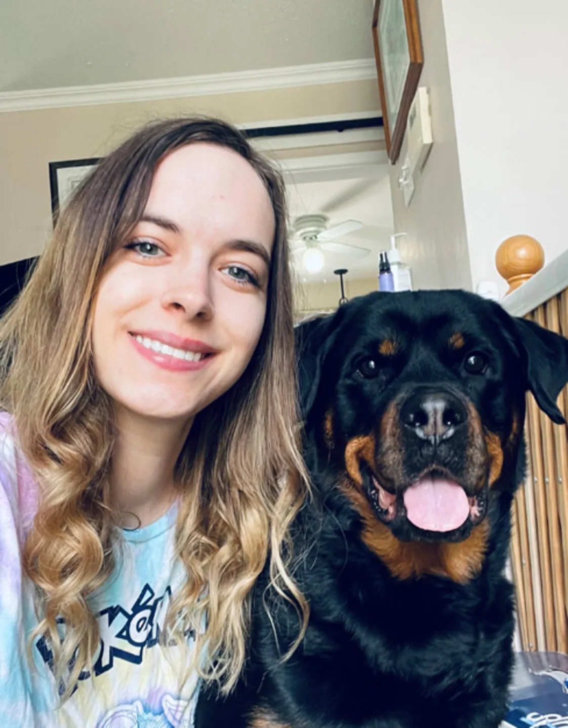 Brittany and a big dog smiling Brittany and a big dog smiling
