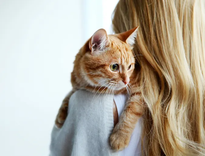 Woman holding a cat