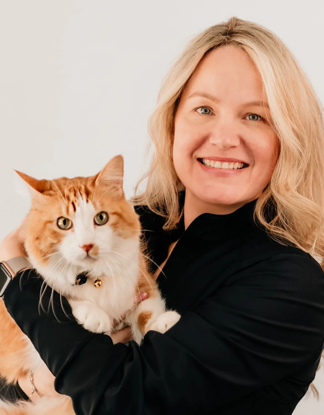 Jessica Weitzel Holding a Cat Jessica Weitzel Holding a Cat