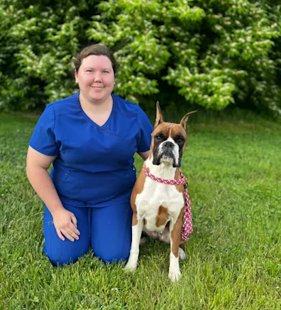 Kaylee New Haven Pet Hospital with a brown and white dog Kaylee New Haven Pet Hospital with a brown and white dog