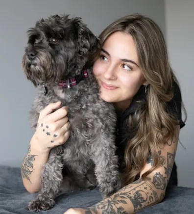 Jocelyn with a fluffy brown dog Jocelyn with a fluffy brown dog