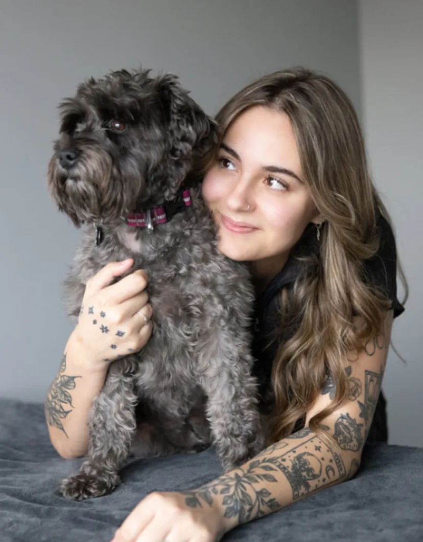 Jocelyn with a fluffy brown dog